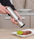 Electric pepper and salt grinder with automatic grinding mechanism for easy seasoning control