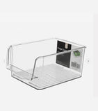 Clear plastic refrigerator organizer bins for storing fruits, vegetables, drinks, and kitchen items neatly